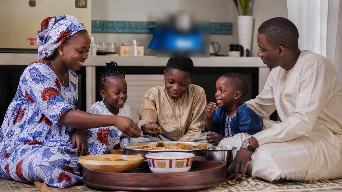 A family sharing a meal together at home